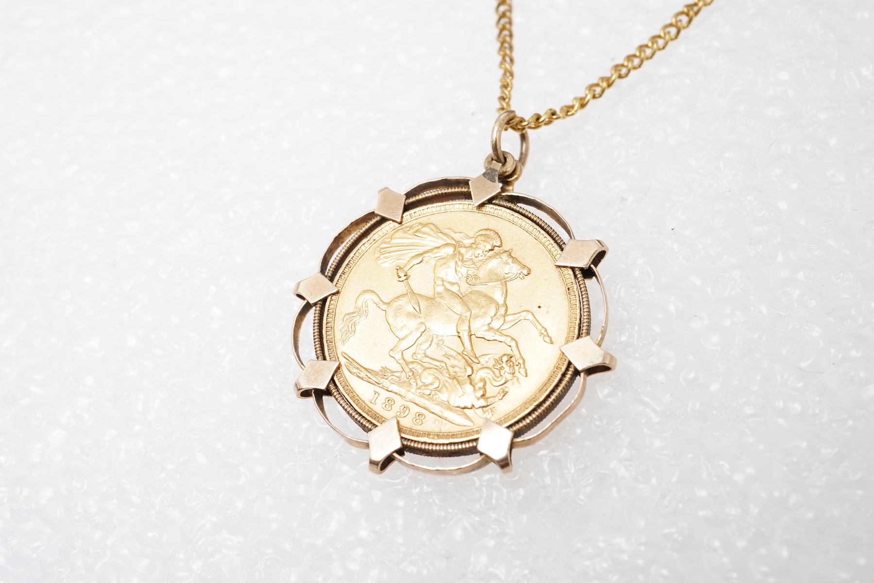 A Victorian sovereign coin pendant, circa 1898 and later
